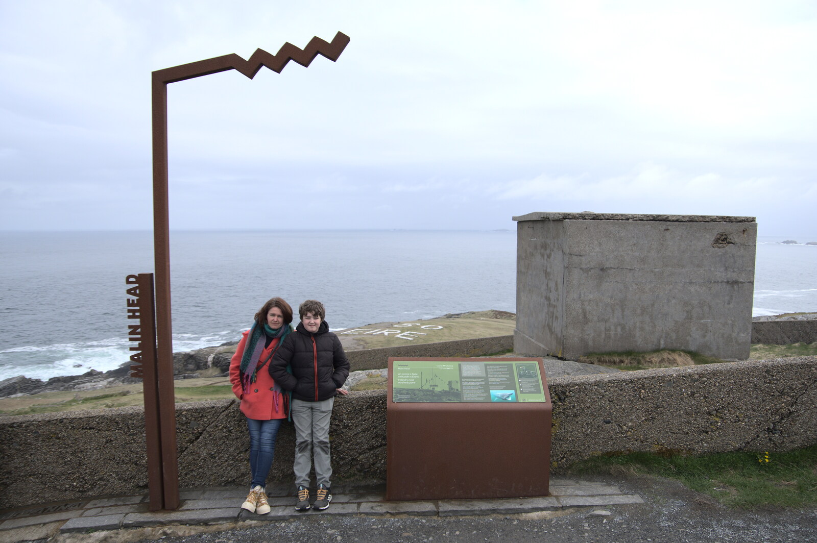 Greencastle, Doagh and Malin Head, County Donegal, Ireland - 19th April 2022: Isobel and Fred under the Malin Head sign