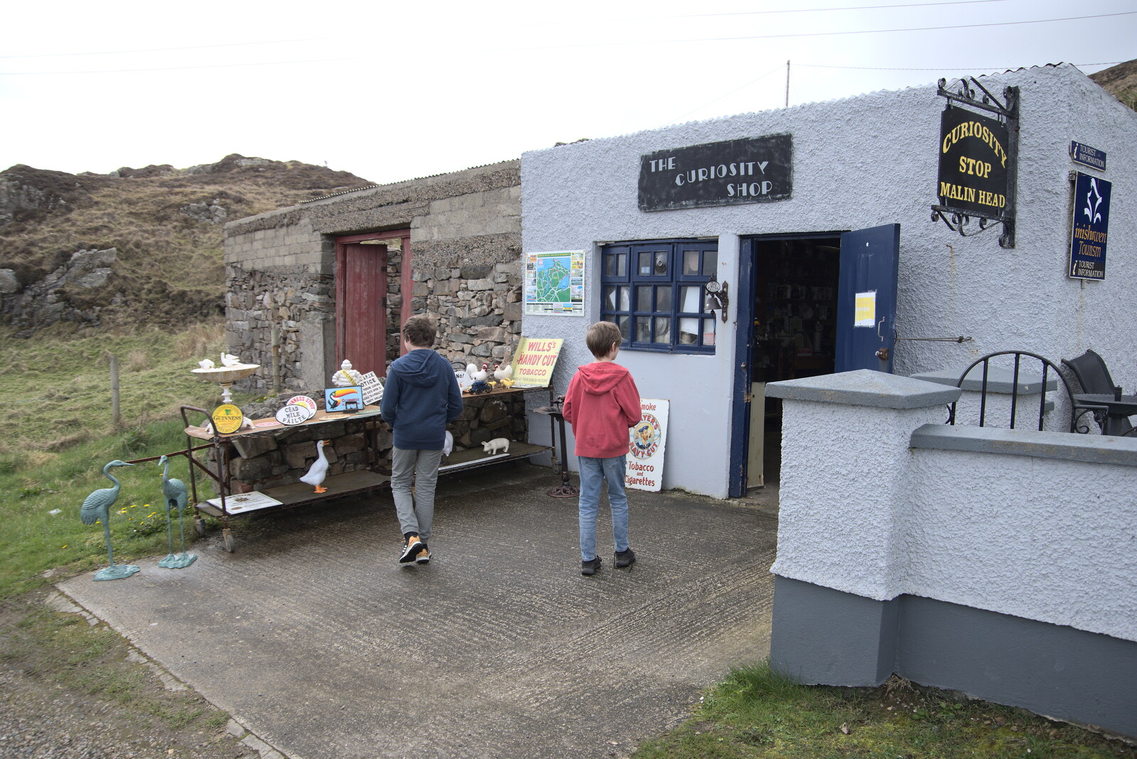 Greencastle, Doagh and Malin Head, County Donegal, Ireland - 19th April 2022: The boys scope out the Curiosity Stop