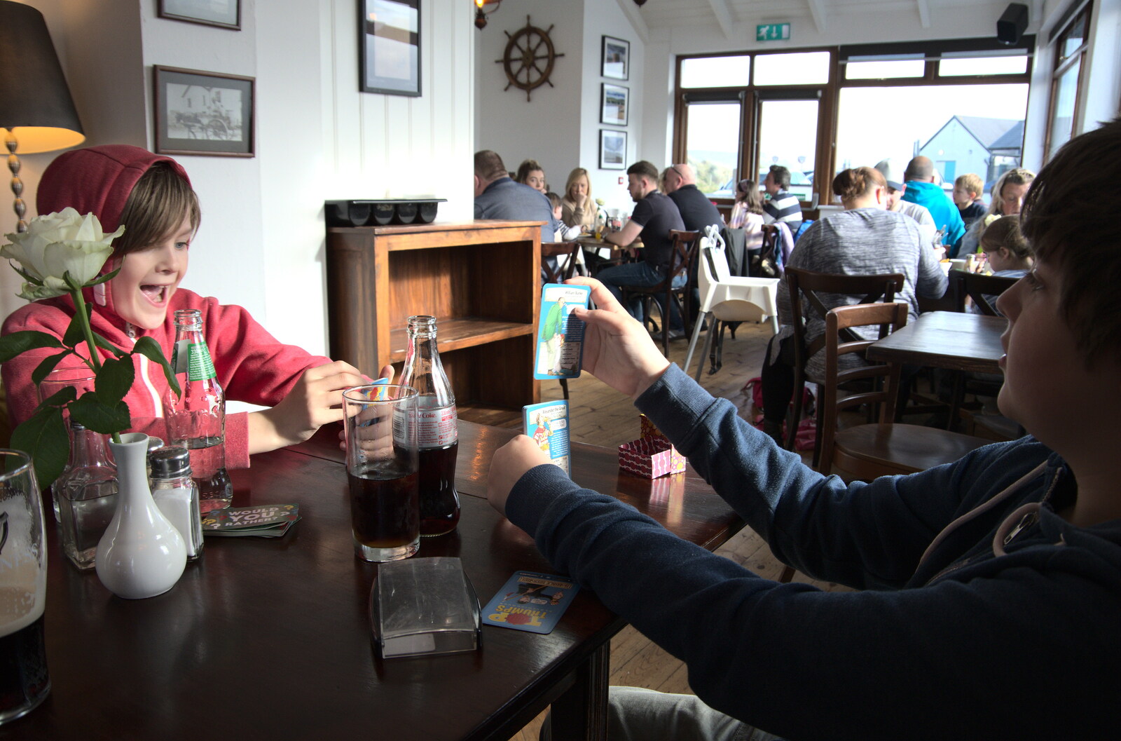 Greencastle, Doagh and Malin Head, County Donegal, Ireland - 19th April 2022: Harry and Fred play Top Trumps