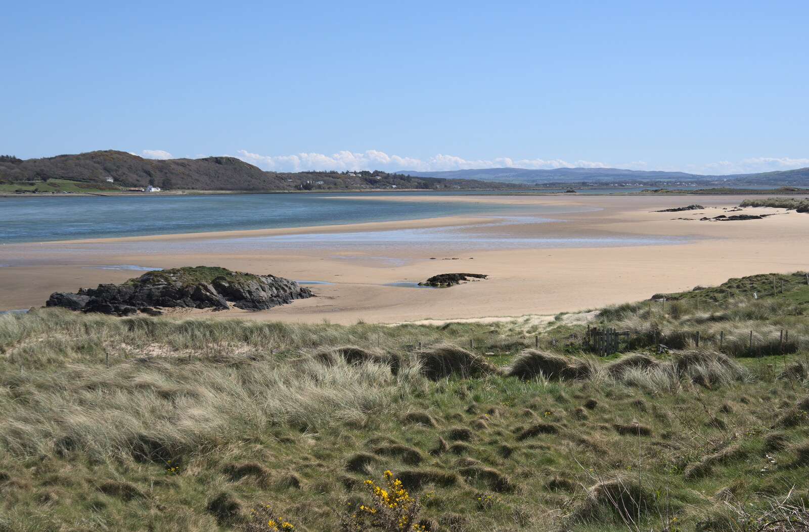 Greencastle, Doagh and Malin Head, County Donegal, Ireland - 19th April 2022: An empty wide beach at Doagh