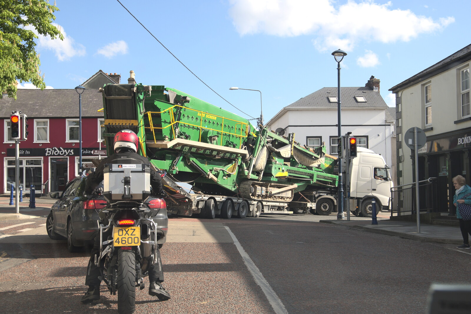 Greencastle, Doagh and Malin Head, County Donegal, Ireland - 19th April 2022: A huge harvester gets stuck in Moville