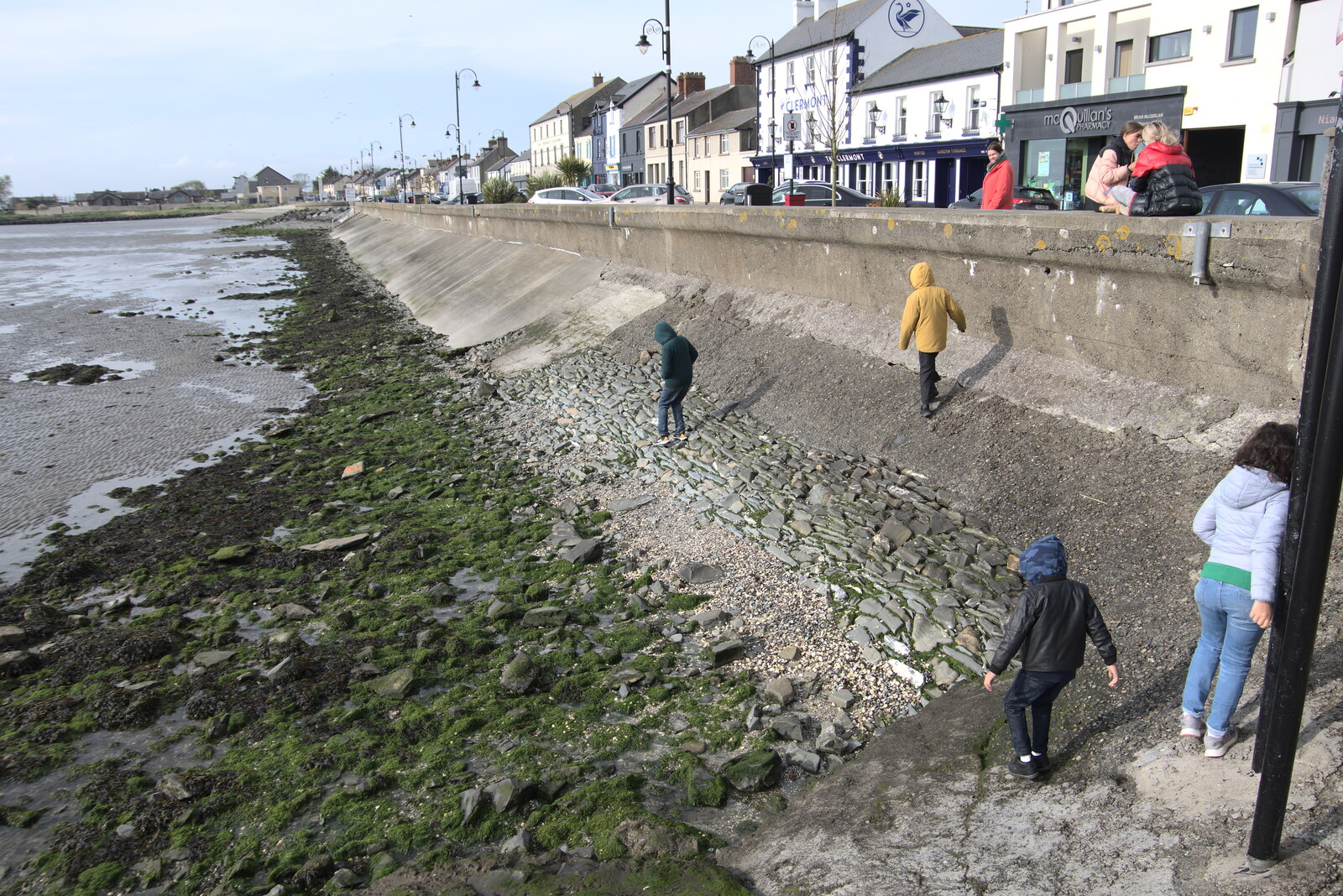 Blackrock North and South, Louth and County Dublin, Ireland - 23rd April 2022: Fred and Harry climb down to the beach