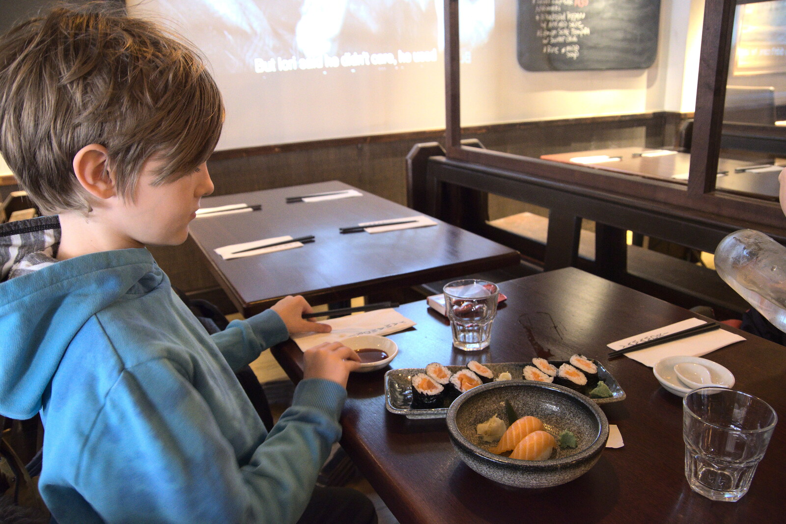 Blackrock North and South, Louth and County Dublin, Ireland - 23rd April 2022: Harry eats salmon sushi in Yamamori