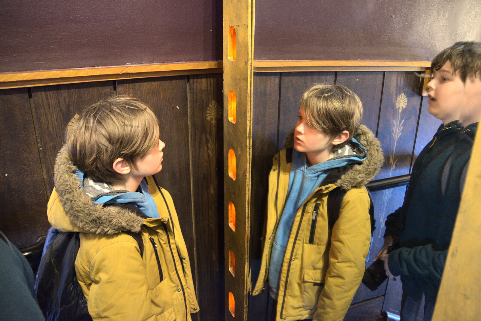 Blackrock North and South, Louth and County Dublin, Ireland - 23rd April 2022: Harry and Fred look in a funky mirror