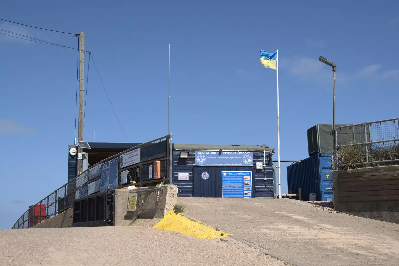 The coastguard station has a Ukrainian flag, from On the Beach at Sea Palling, Norfolk - 8th May 2022