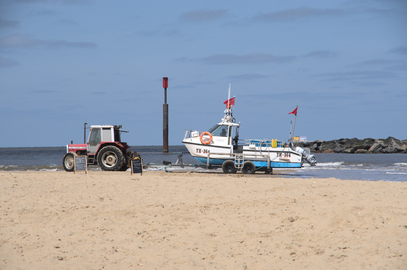 A tour boat and tractor wait on the beach from On the Beach at Sea Palling, Norfolk - 8th May 2022