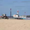 A tour boat and tractor wait on the beach, On the Beach at Sea Palling, Norfolk - 8th May 2022