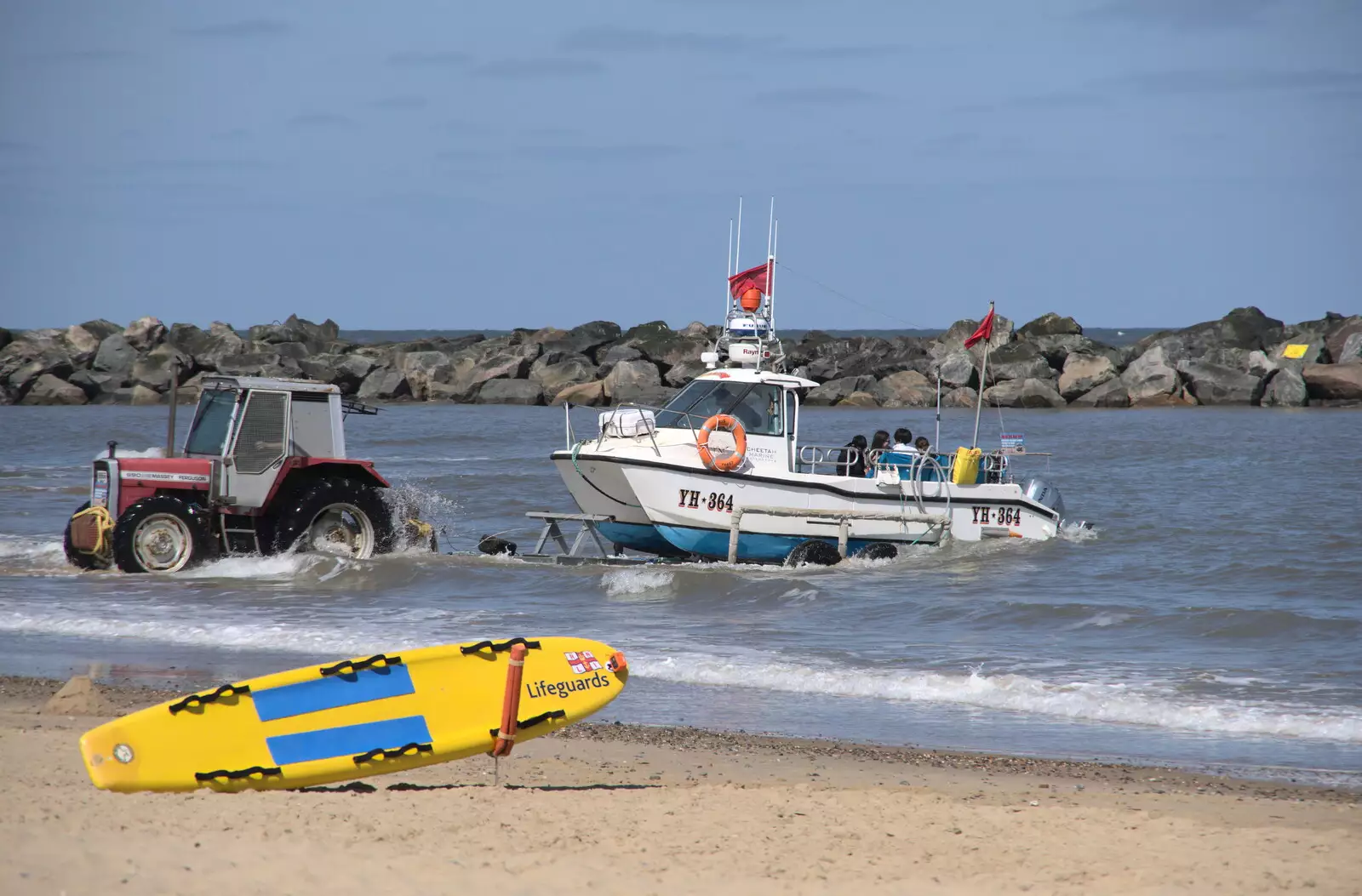 The tour boat puts out to sea, from On the Beach at Sea Palling, Norfolk - 8th May 2022