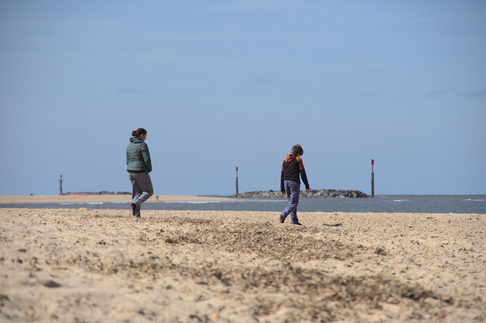 Isobel and Fred wander off for a walk from On the Beach at Sea Palling, Norfolk - 8th May 2022