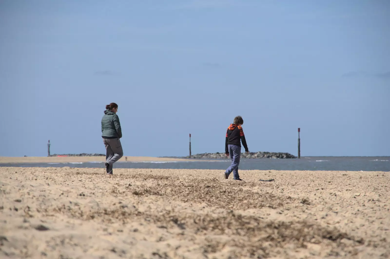 Isobel and Fred wander off for a walk, from On the Beach at Sea Palling, Norfolk - 8th May 2022