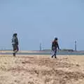 Isobel and Fred wander off for a walk, On the Beach at Sea Palling, Norfolk - 8th May 2022