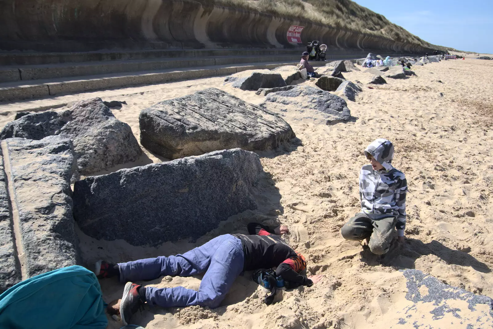 Fred literally has his head in the sand, from On the Beach at Sea Palling, Norfolk - 8th May 2022