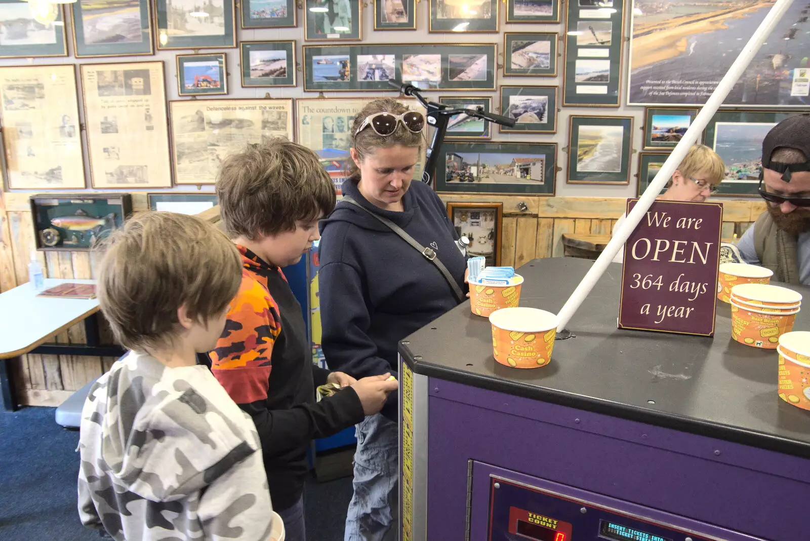 Fred feeds the ticket-eating machine, from On the Beach at Sea Palling, Norfolk - 8th May 2022