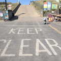 2022 Harry picks some up near a big Keep Clear sign
