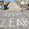 Harry picks some up near a big Keep Clear sign, On the Beach at Sea Palling, Norfolk - 8th May 2022