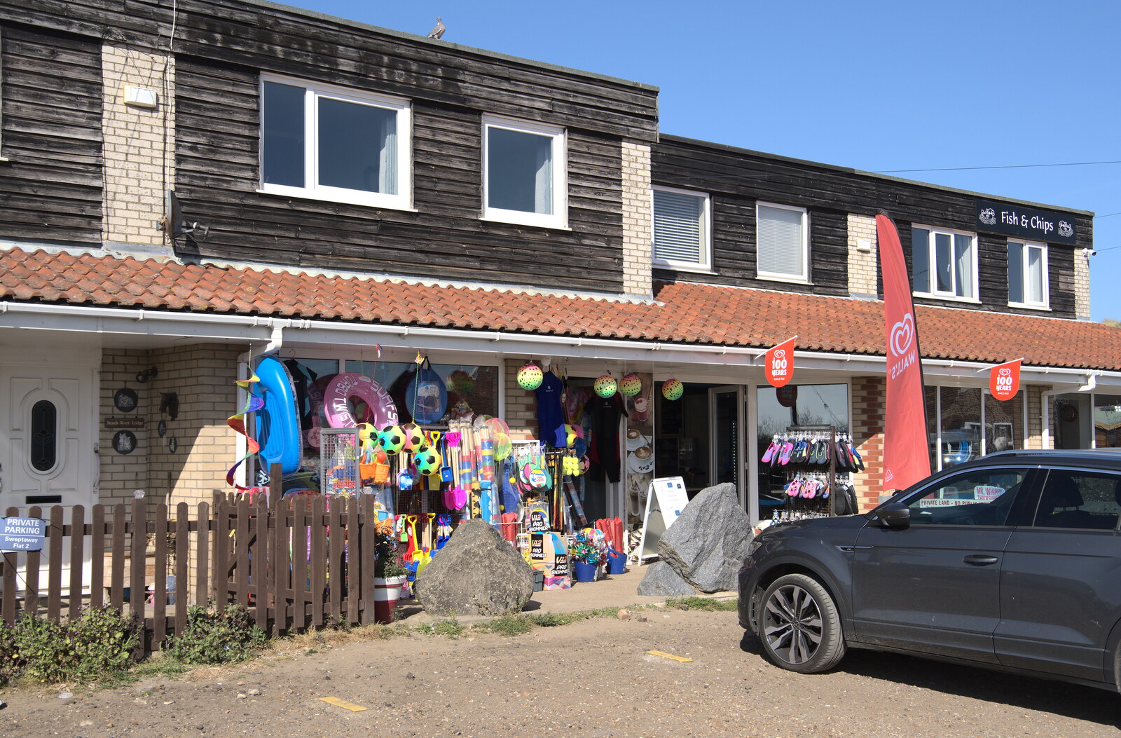 A beach tat shop in an 80s building block from On the Beach at Sea Palling, Norfolk - 8th May 2022