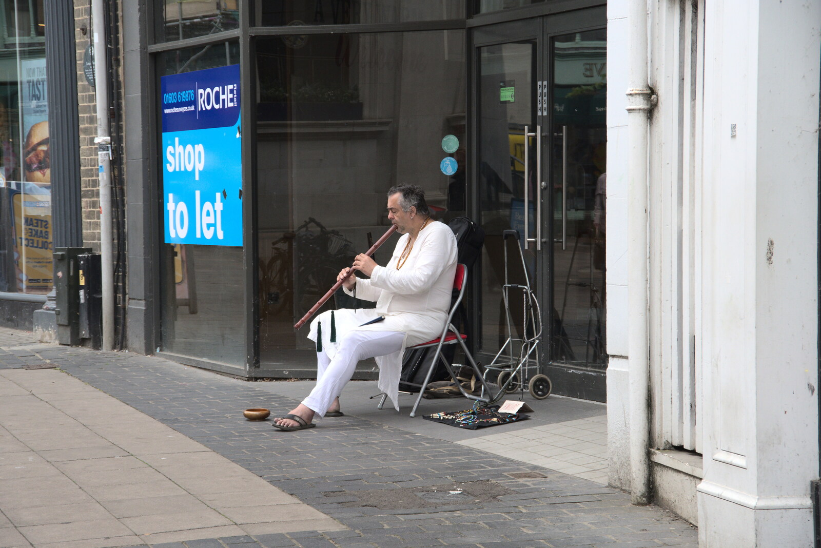 Some dude plays recorder on London Street from Discovering the Hidden City: Norwich, Norfolk - 23rd May 2022
