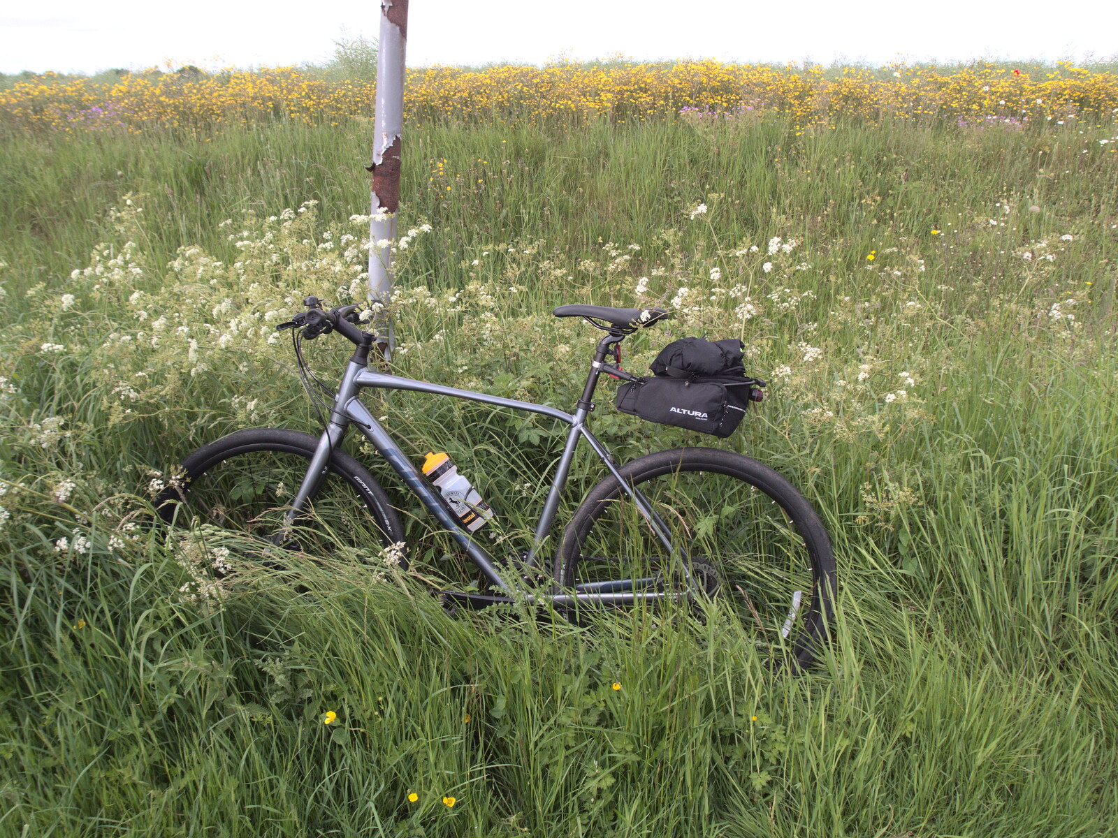 Nosher's bike leans on a post from The Jubilee Torch Run, Brome and Oakley, Suffolk - 25th May 2022