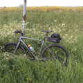 2022 Nosher's bike leans on a post