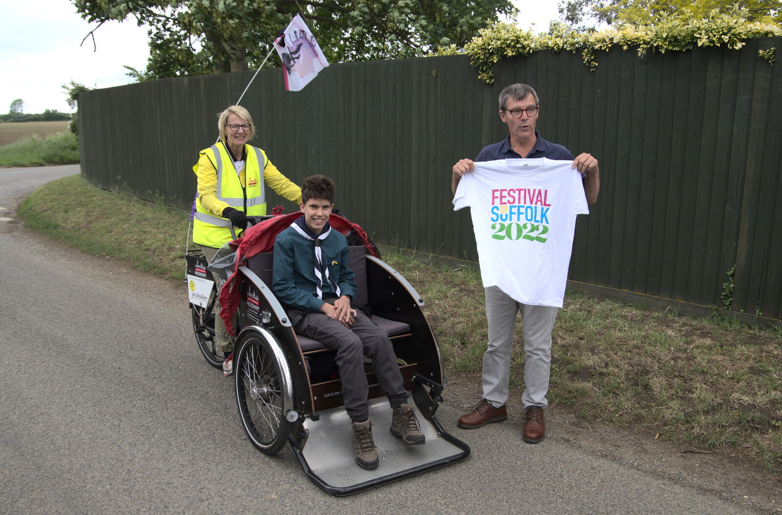 Jack is installed in the rickshaw from The Jubilee Torch Run, Brome and Oakley, Suffolk - 25th May 2022