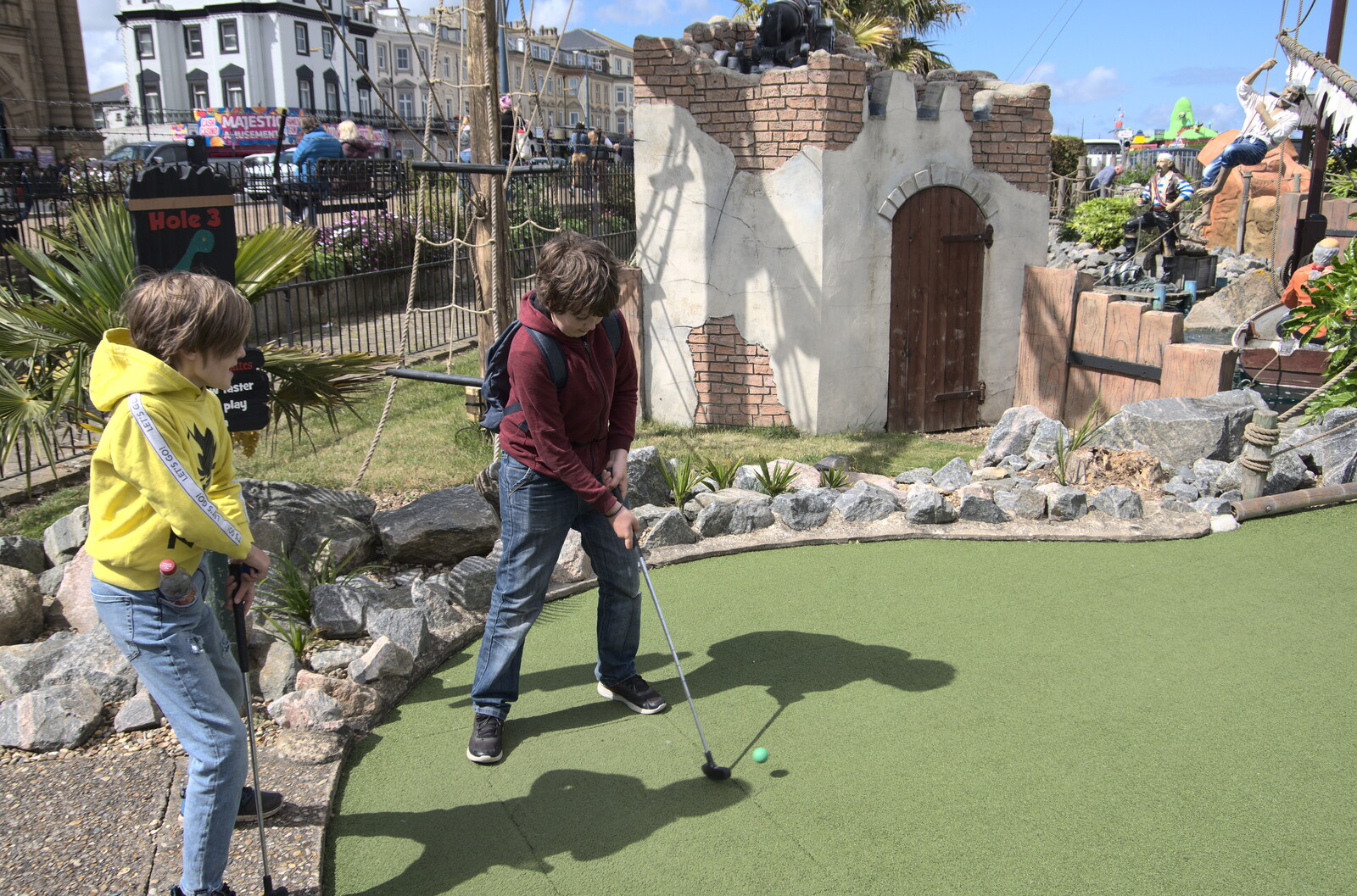 Fred lines up at crazy golf from Faded Seaside Glamour: A Weekend in Great Yarmouth, Norfolk - 29th May 2022