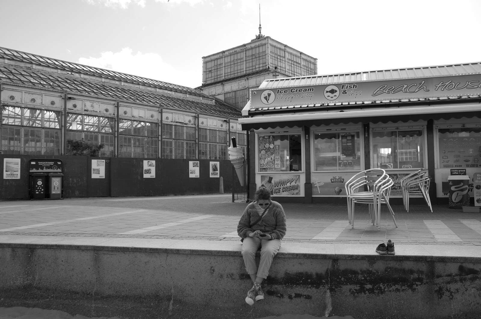 Isobel checks her phone from Faded Seaside Glamour: A Weekend in Great Yarmouth, Norfolk - 29th May 2022