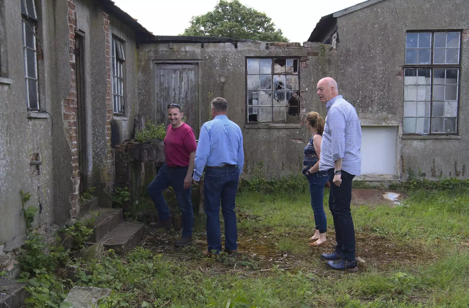 Clive grins as we enter another building, from A 1940s Timewarp, Site 4, Bungay Airfield, Flixton, Suffolk - 9th June 2022