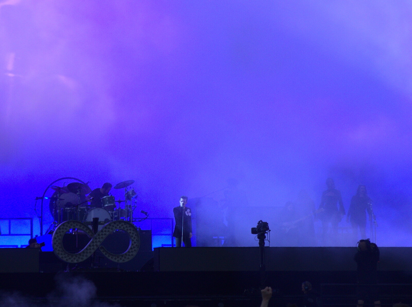 The Killers at Carrow Road, Norwich, Norfolk - 9th June 2022: Brandon Flowers in a sea of dry ice