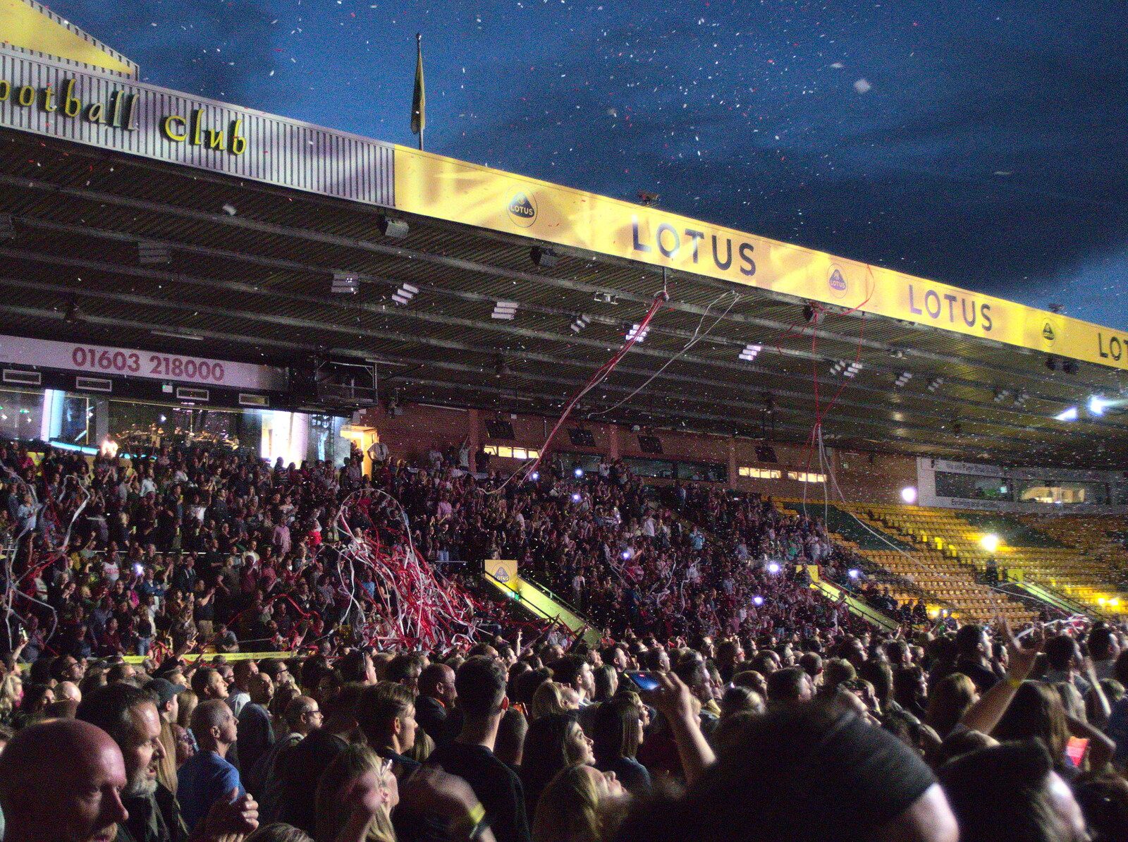The Killers at Carrow Road, Norwich, Norfolk - 9th June 2022: A big ball of streamers lands in the stands