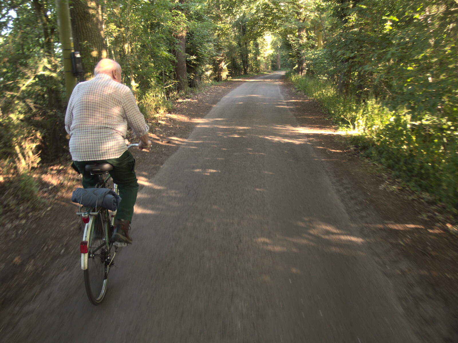 Mick the Brick cycles through Thornham Woods from Pizza at the Village Hall, Brome, Suffolk - 24th June 2022