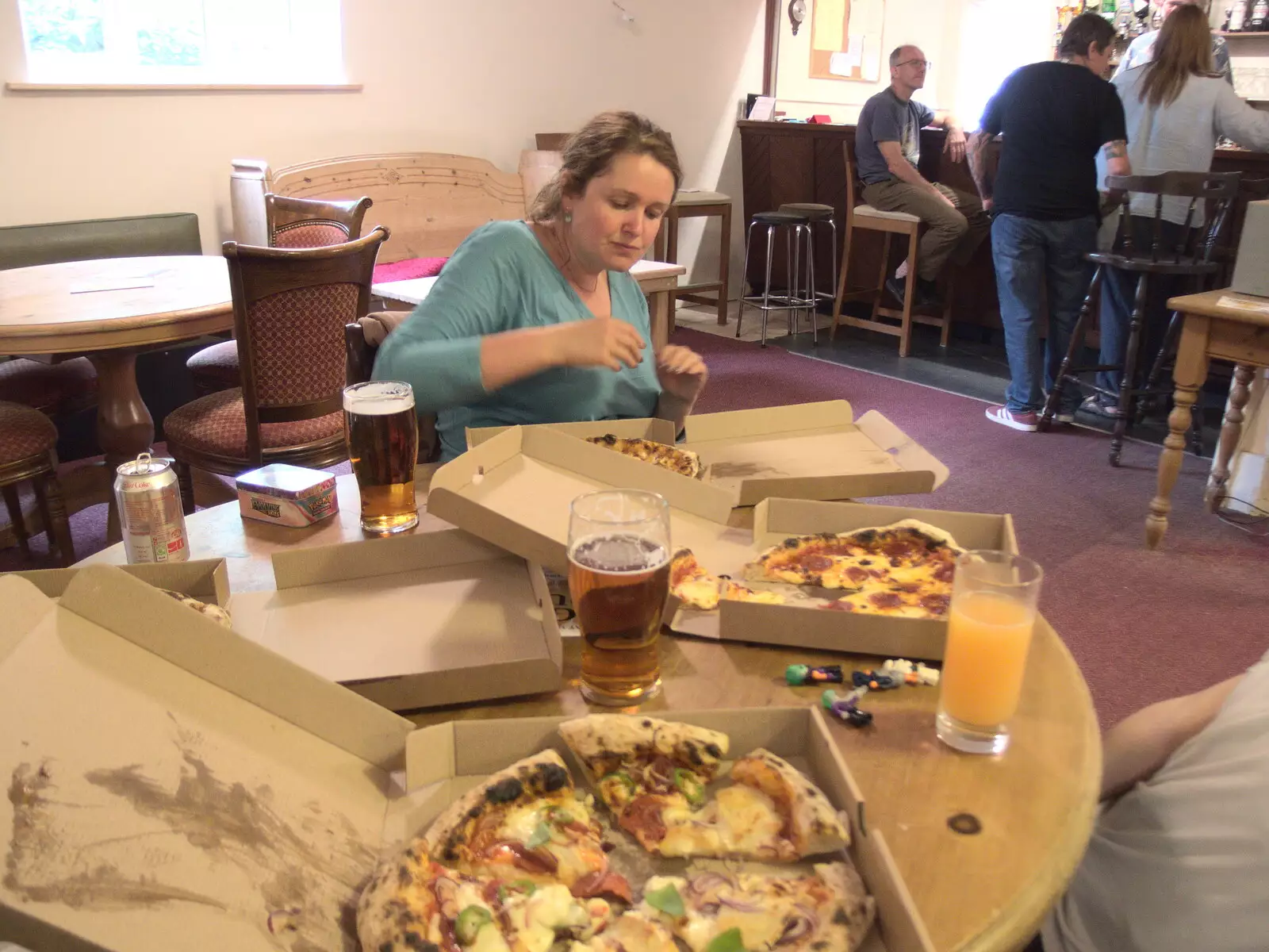 We eat our pizza by the bar, from Pizza at the Village Hall, Brome, Suffolk - 24th June 2022