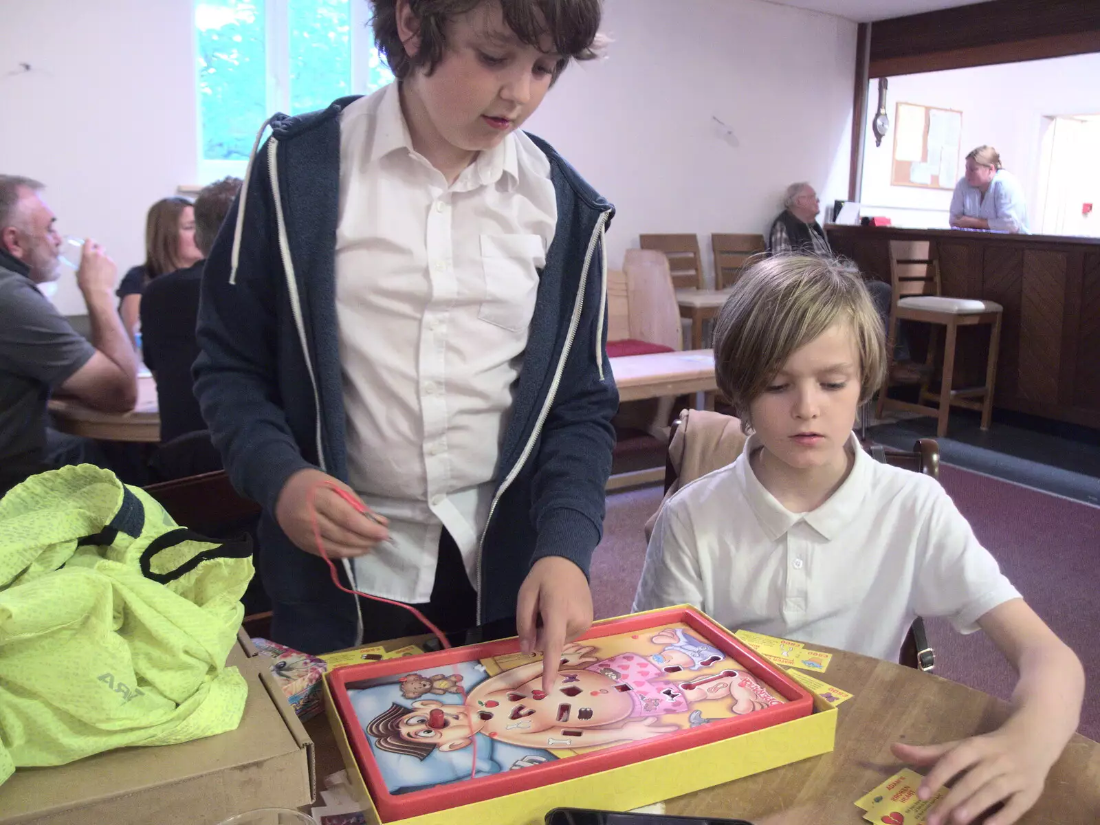 Harry finds an old-skool Operation game, from Pizza at the Village Hall, Brome, Suffolk - 24th June 2022