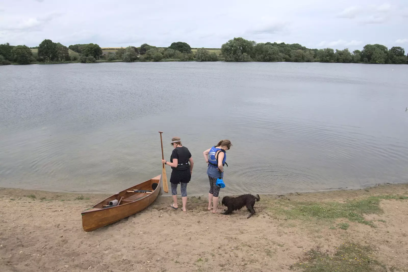 Isobel and Allyson head out in the canoe, from Camping at the Lake, Weybread, Harleston - 25th June 2022