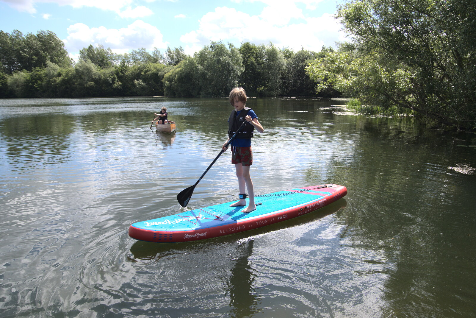 Harry does some stand-up paddle boarding from Camping at the Lake, Weybread, Harleston - 25th June 2022