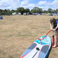 Camping at the Lake, Weybread, Harleston - 25th June 2022, Harry pumps up another paddle board