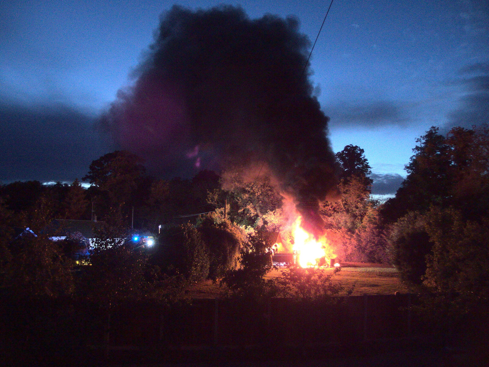 A wall of smoke drifts over the Oaksmere from A Fire, a Fête, and a Scout Camp, Hallowtree, Suffolk - 30th June 2022
