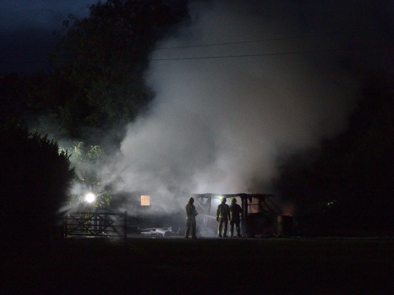 Firemen stand around from A Fire, a Fête, and a Scout Camp, Hallowtree, Suffolk - 30th June 2022