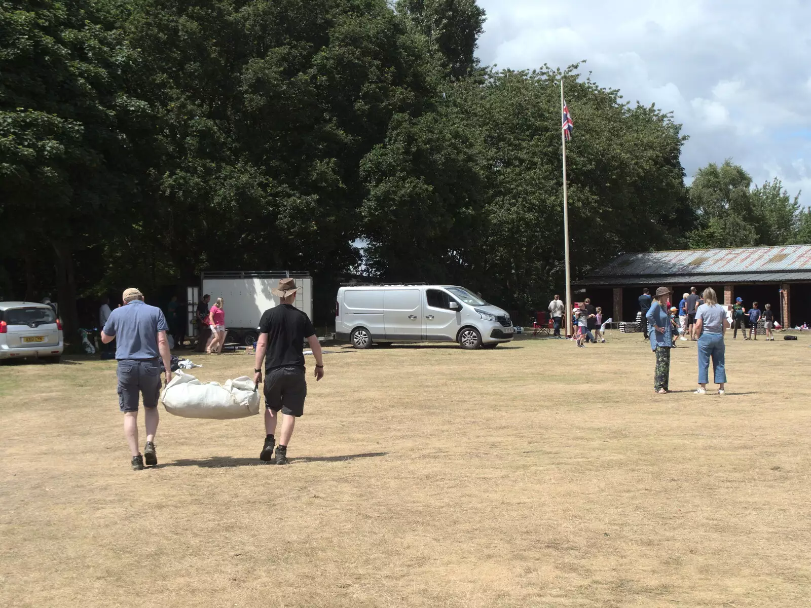 Colin and Andy haul a tent away, from A Fire, a Fête, and a Scout Camp, Hallowtree, Suffolk - 30th June 2022