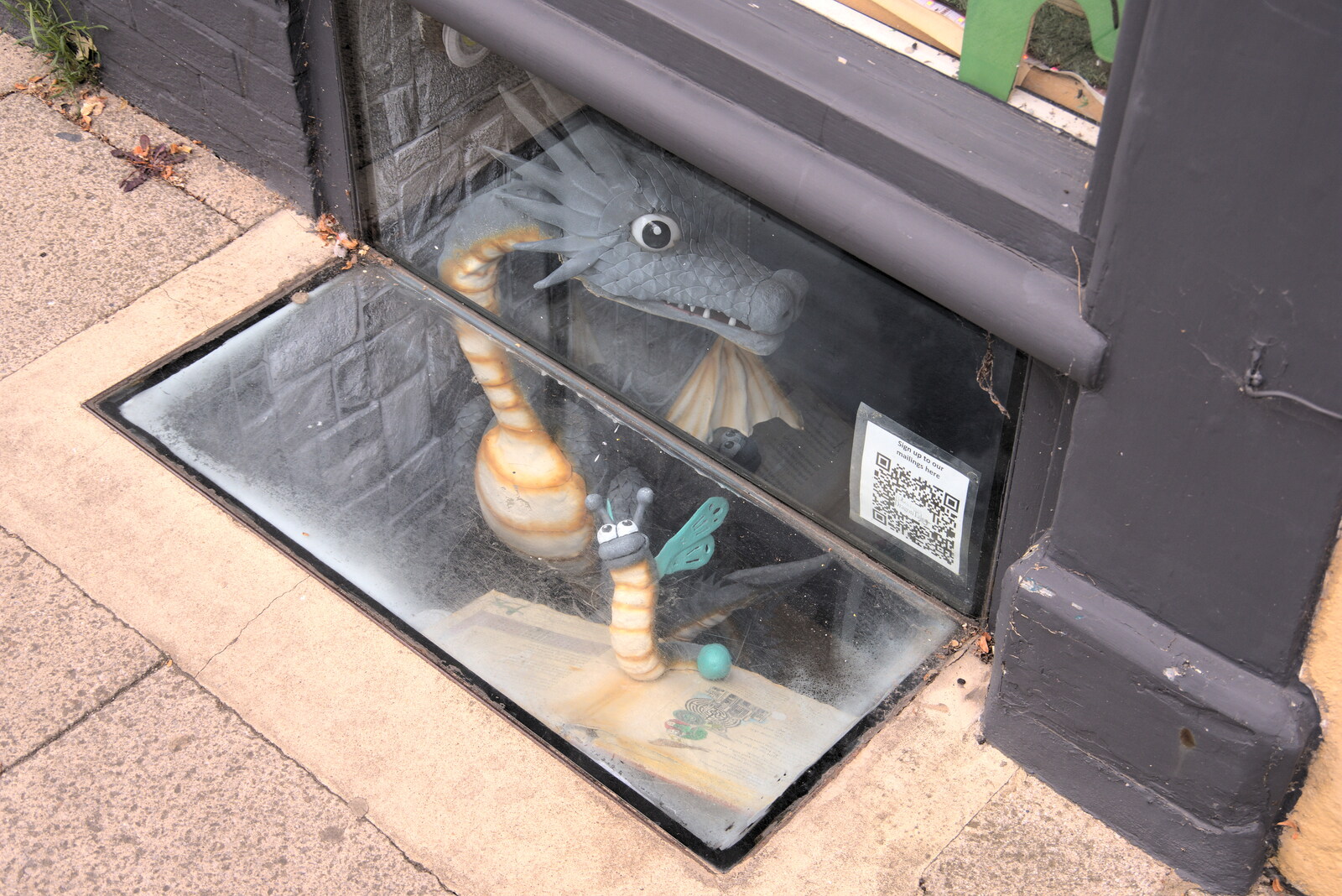 A cool dragon and caterpillar in a basement window from The Lord Mayor's Procession, Norwich, Norfolk - 2nd July 2022