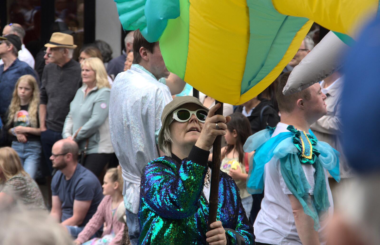 A woman struggles with an inflatable from The Lord Mayor's Procession, Norwich, Norfolk - 2nd July 2022