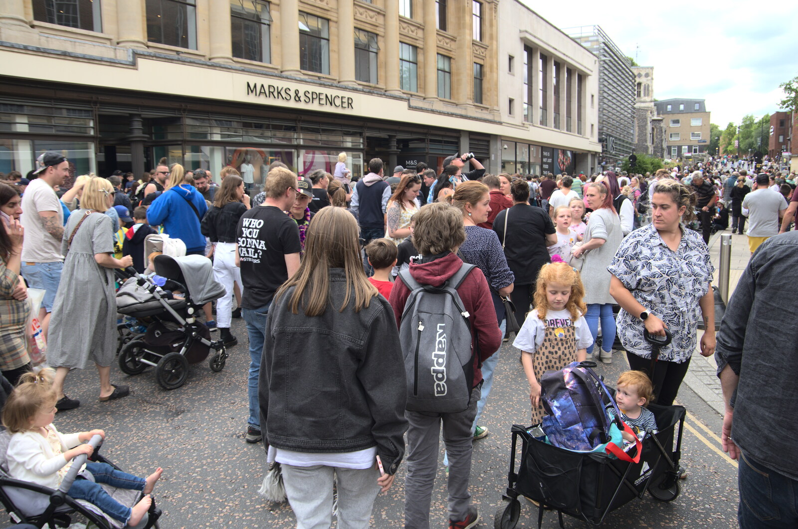 Isobel, Fred and Sophie head through the crowds from The Lord Mayor's Procession, Norwich, Norfolk - 2nd July 2022