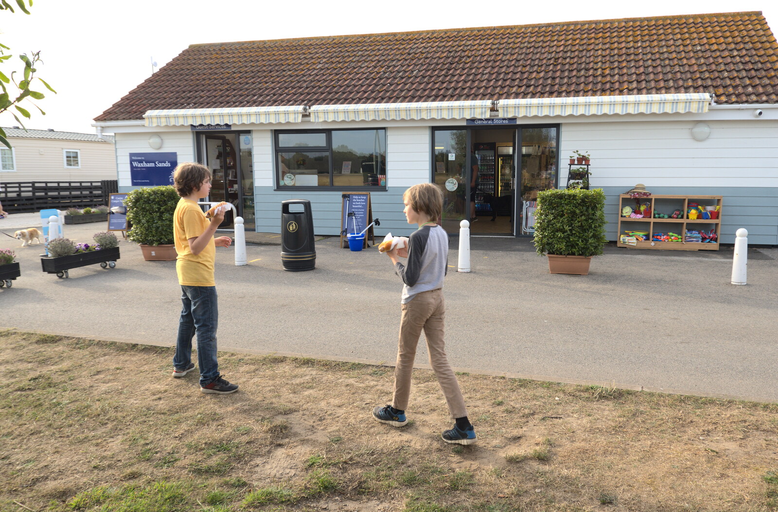 Fred and Harry roam around outside the shop from Camping in the Dunes, Waxham Sands, Norfolk - 9th July 2022