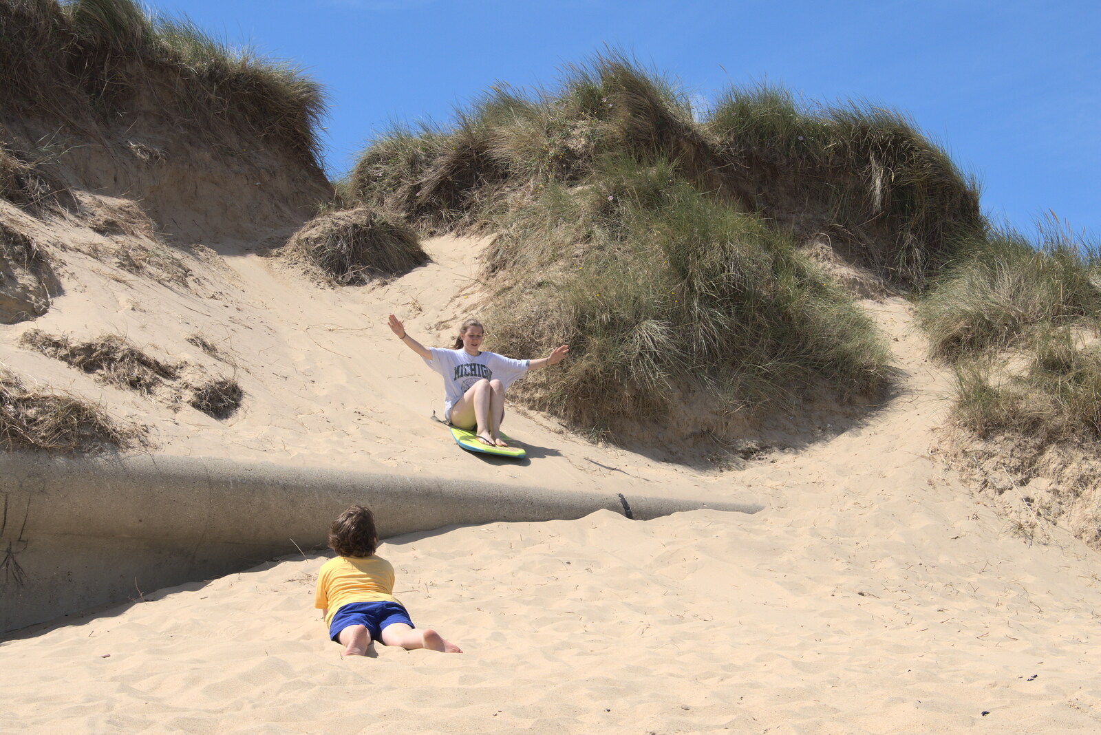 Sophie does some sand surfing from Camping in the Dunes, Waxham Sands, Norfolk - 9th July 2022