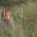 Camping in the Dunes, Waxham Sands, Norfolk - 9th July 2022, Harry sits in the dune grass