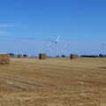 A Ride to Walsham Le Willows, Suffolk - 15th July 2022, Stacked bales and the wind turbines