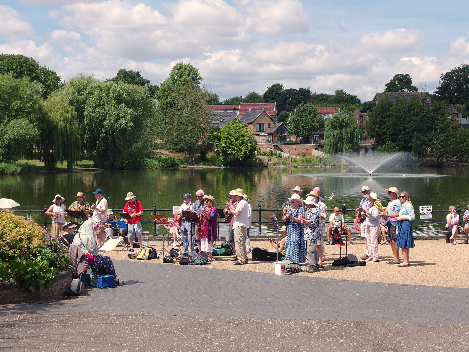 There's a ukulele band playing by the Mere in Diss from A Ride to Walsham Le Willows, Suffolk - 15th July 2022