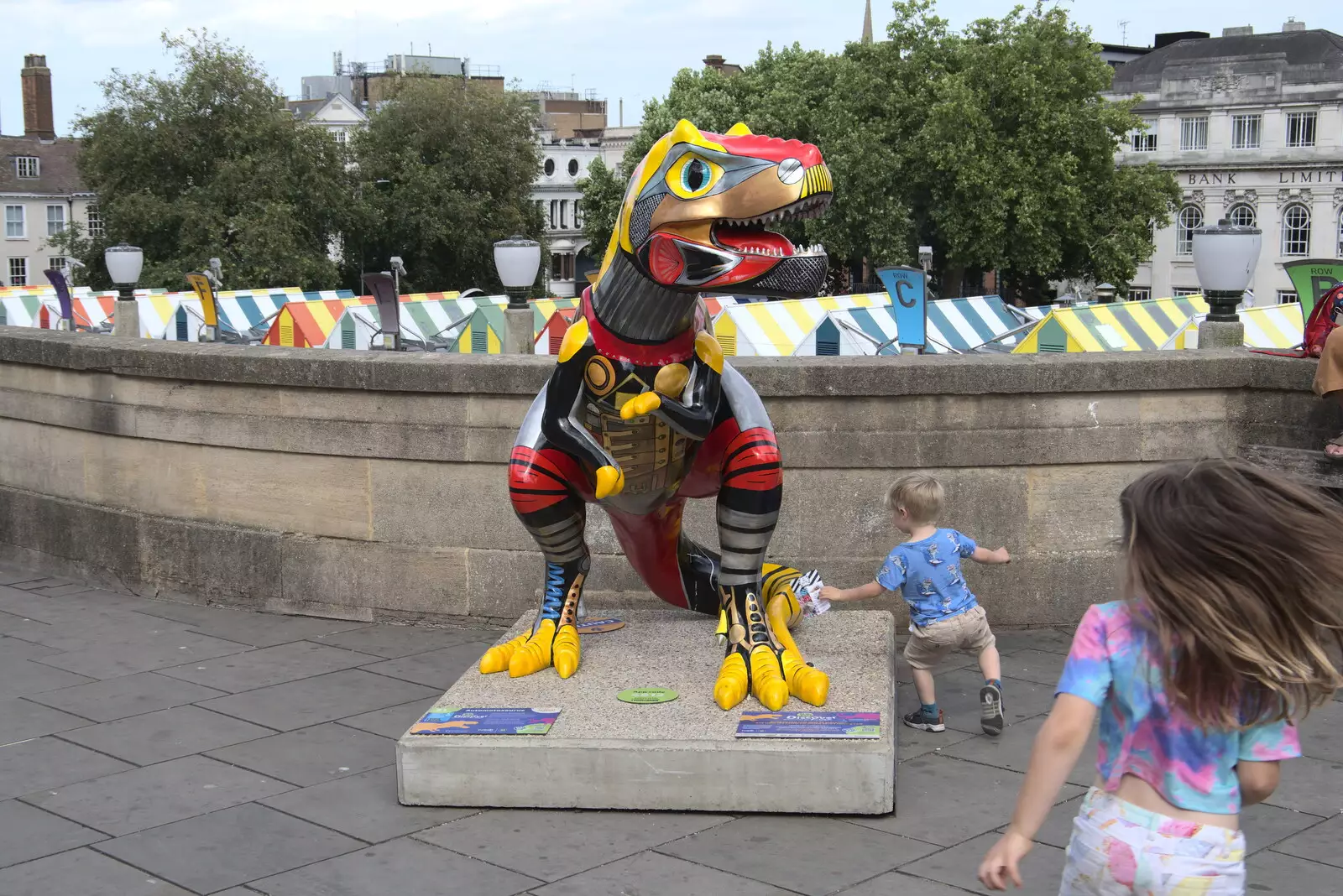 Children swarm over a dinosaur above the market, from A July Miscellany, Diss, Eye and Norwich - 23rd July 2022