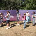 A Day at Latitude, Henham Park, Suffolk - 24th July 2022, Phil and Harry in the queue for wristbands