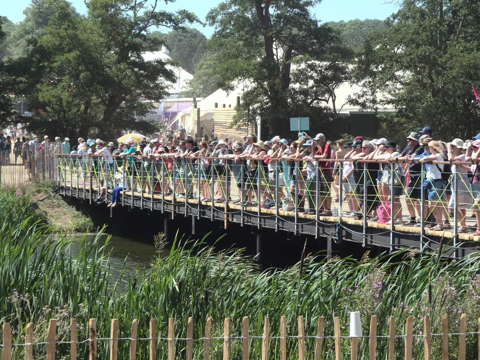 Crowds watch from the bridge, from A Day at Latitude, Henham Park, Suffolk - 24th July 2022