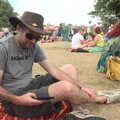 A Day at Latitude, Henham Park, Suffolk - 24th July 2022, Phil checks his phone